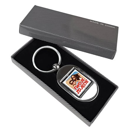 Elegancki ciężki, metalowy, obrotowy brelok z dwoma zdjęciami.