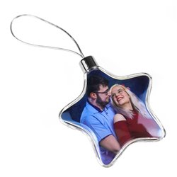 Foto bombka na choinkę w kształcie gwiazdki z dwoma zdjęciami. 2