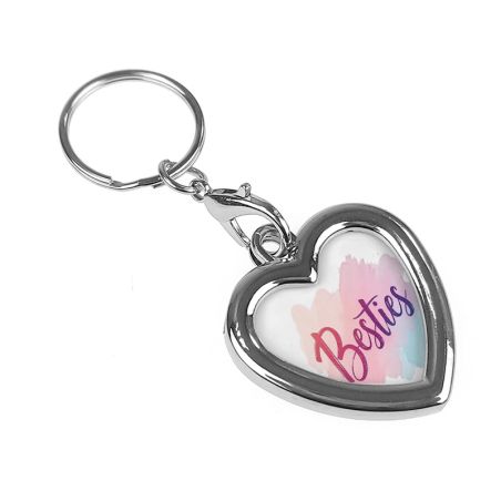 Metalowy brelok serce ze zdjęciem oraz grafiką Besties dla przyjaciółek - dwustronna ramka- idealny na prezent.